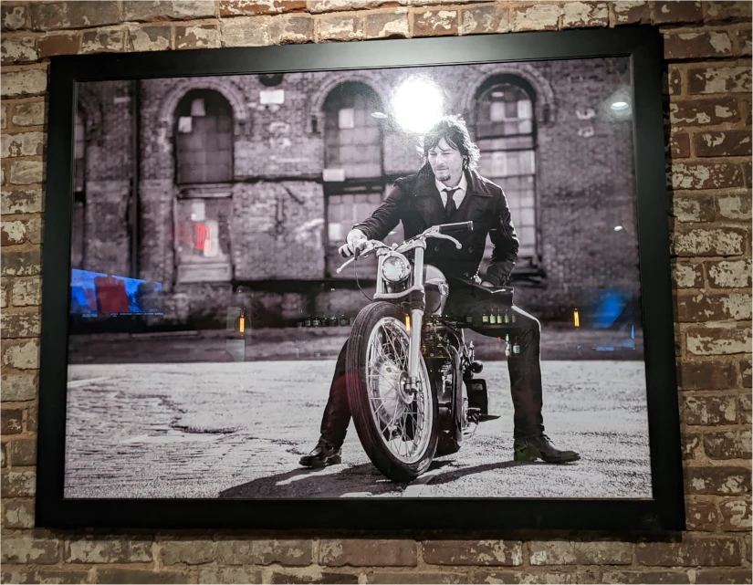norman reedus on a bike at nic and norman's